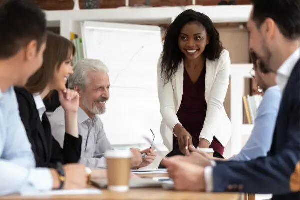 People having a meeting in an office.